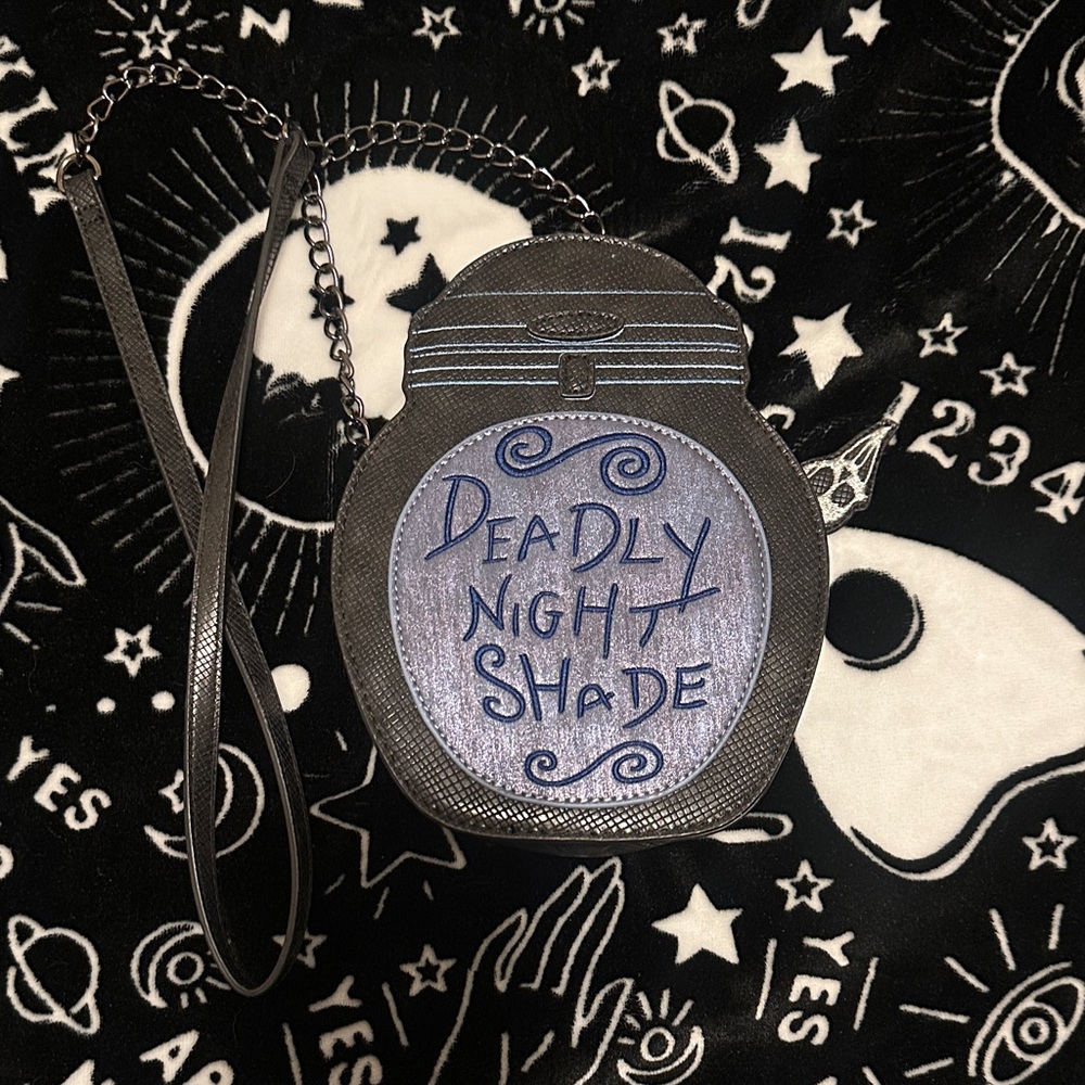 Danielle Nicole Black Crossbody Bag with Purple Accent "Deadly Night Shade"